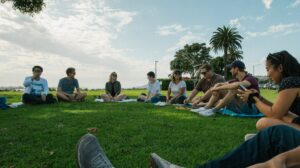 a group of people sitting outside